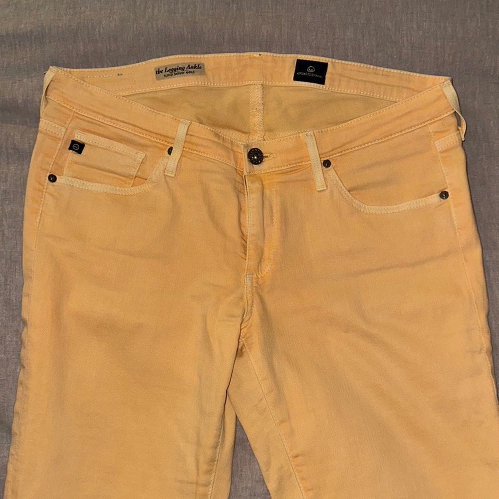 AG Super Skinny Ankle jeans in pastel orange. Size 29.